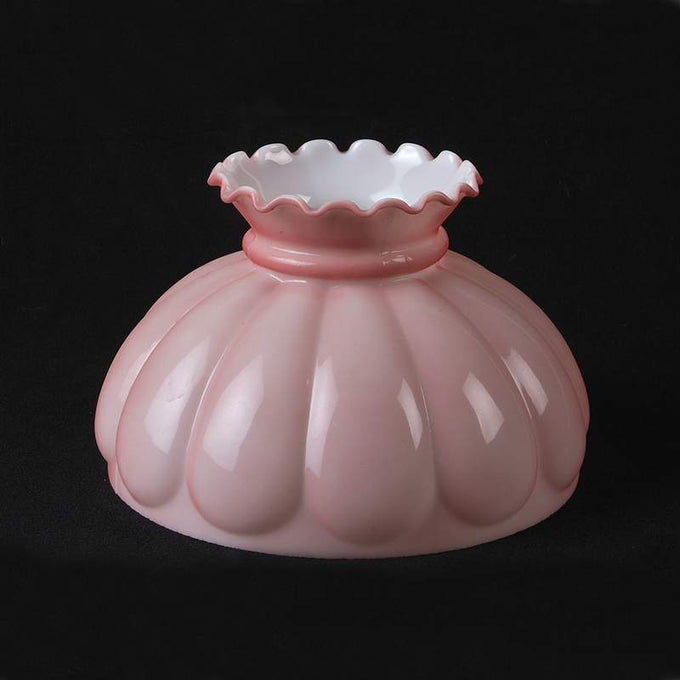 Pink glass oil lamp shade with a Victorian-inspired scalloped top and ribbed design, suitable for lamps and lighting, parts and accessories, and lamp shade collections.