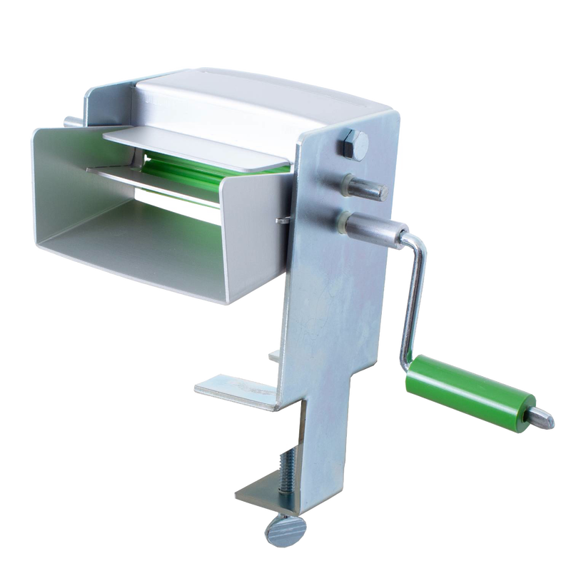 Sturdy metal pea sheller with a green handle crank and clamp base, designed for home kitchen use and specialty food preparation, made in USA, perfect for peelers and pitters collections.