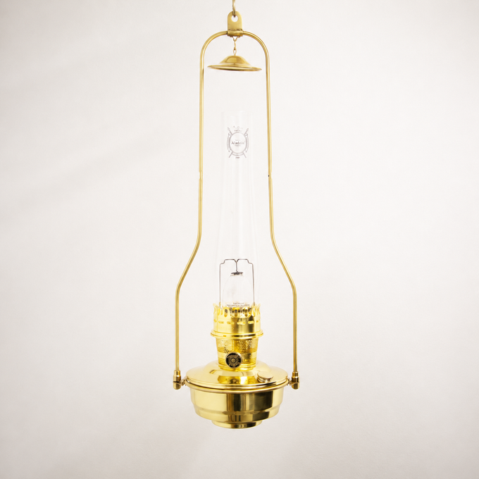 Polished brass hanging bracket with tilt-frame design holding a classic oil lamp with clear glass chimney, ideal for Lamps & Lighting, Oil Lamps, and Hanging Lamps collections.