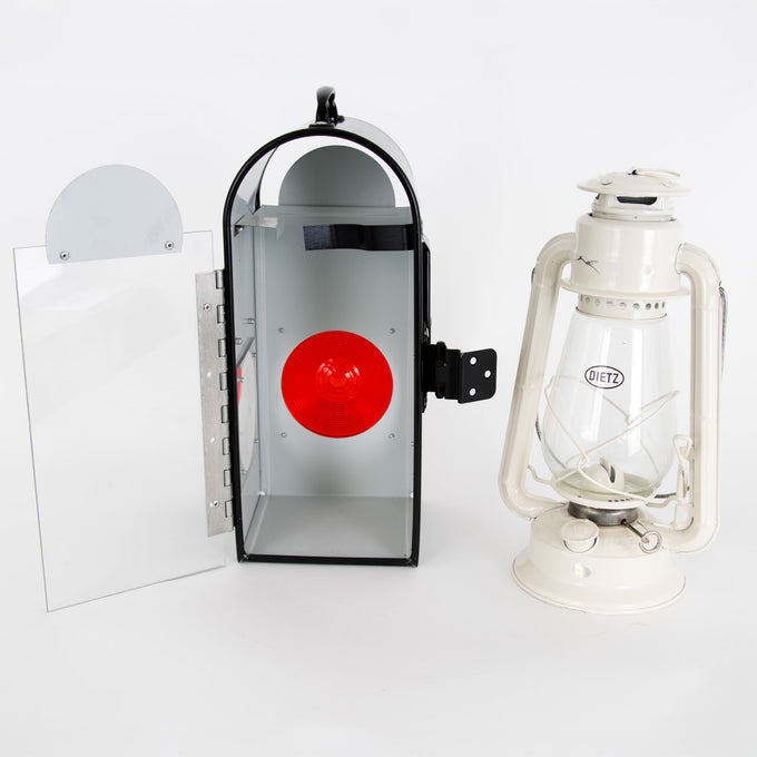 Handcrafted Amish buggy carriage lantern box with hinged clear door and red rear reflector, paired with a white Dietz oil lantern, ideal for lamps, camping, and emergency supplies.