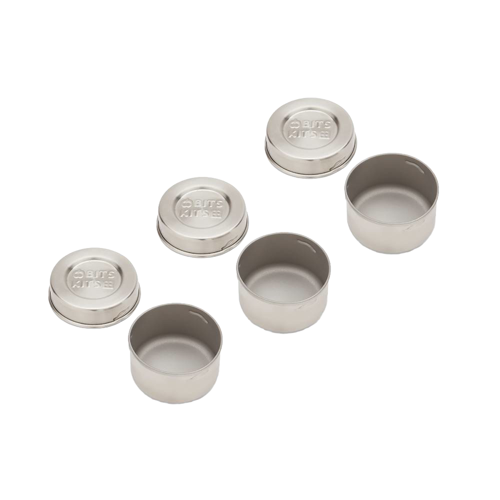 Set of three reusable stainless steel condiment containers with airtight silicone gasket lids, designed for leak-resistant storage, part of Kitchen & Food and Storage and Serving collections.