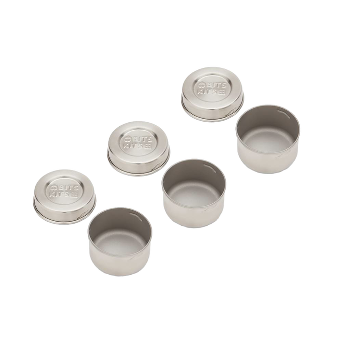 Set of three reusable stainless steel condiment containers with airtight silicone gasket lids, designed for leak-resistant storage, part of Kitchen & Food and Storage and Serving collections.