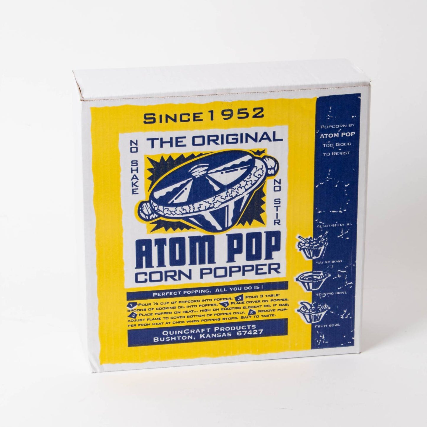 Vintage-style cardboard packaging for an aluminum stovetop popcorn popper with bright yellow and blue retro graphics, featured in Kitchen & Food and Cookware collections.