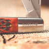 Close-up of a handcrafted Old-Fashioned Barlow pocket knife with a polished bone handle and engraved steel bolster, featured in Farm, Garden & Tool and Traditional Pocket Knives collections.