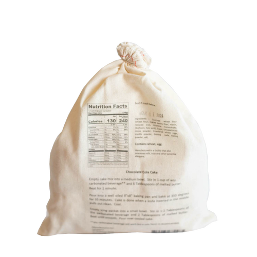 Natural fabric drawstring bag containing handcrafted chocolate cola cake mix with clear nutrition facts and baking instructions, ideal for Kitchen & Food, Pantry, Dry Goods and Mixes, Best Sellers, Promo Eligible collections.