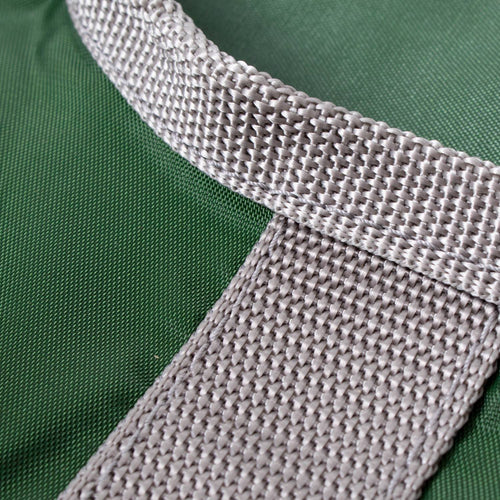 Close-up of a durable woven beige strap attached to a dark green Amish clothespin bag, handcrafted in the USA, ideal for laundry and clothesline use in home and decor collections.
