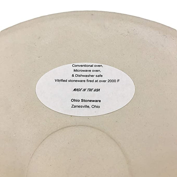 Bottom of a handcrafted 3-gallon stoneware crock showing a white oval label with product care instructions, made in USA, ideal for Kitchen & Food, Food Preservation, Fermenting and Pickling collections.