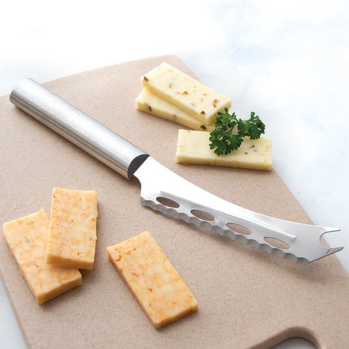Handcrafted stainless steel serrated cheese knife with ergonomic handle on a cutting board, slicing through soft and hard cheeses, part of USA Made Kitchen & Food collections.