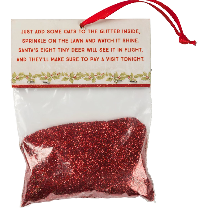 Small bag of red glitter with festive header card featuring a holiday poem about sprinkling glitter and oats for Santa’s reindeer, perfect for Home & Decor, Holiday Decor, Best Sellers, Promo Eligible collections.