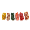 Colorful handcrafted handspun ribbon candy pieces in yellow, red, green, pink, and two shades of red, showcasing different flavors, perfect for Kitchen & Food and USA Made collections.