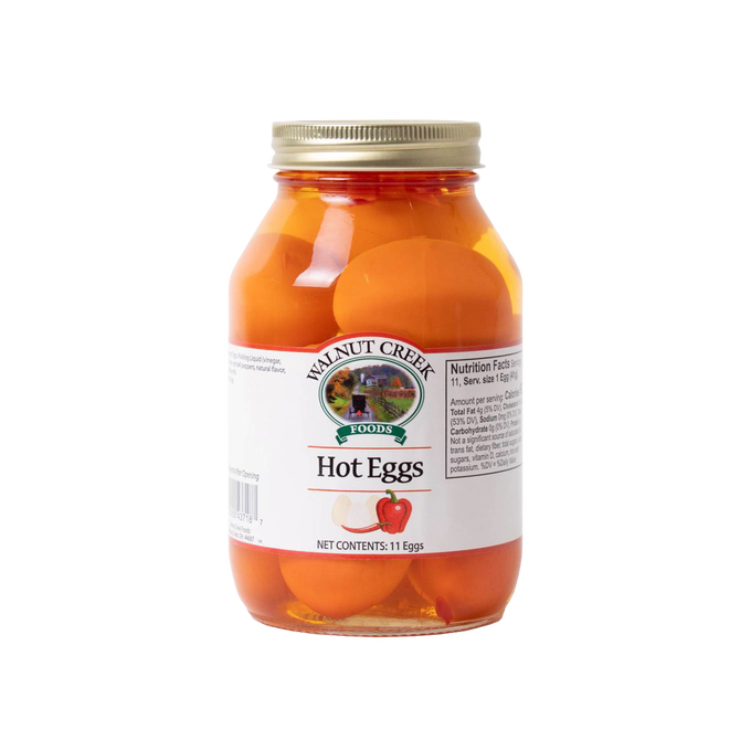 Glass jar of handcrafted hot pickled eggs in spicy red brine, locally made in USA and featured in Kitchen & Food, Food, Pantry, USA Made, and Best Sellers collections.