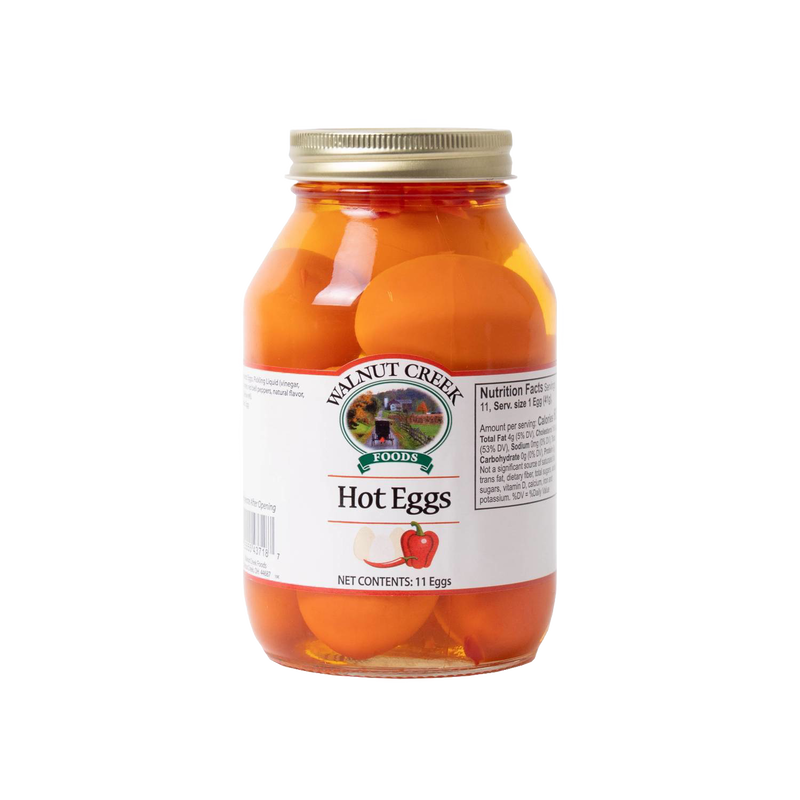 Glass jar of handcrafted hot pickled eggs in spicy red brine, locally made in USA and featured in Kitchen & Food, Food, Pantry, USA Made, and Best Sellers collections.