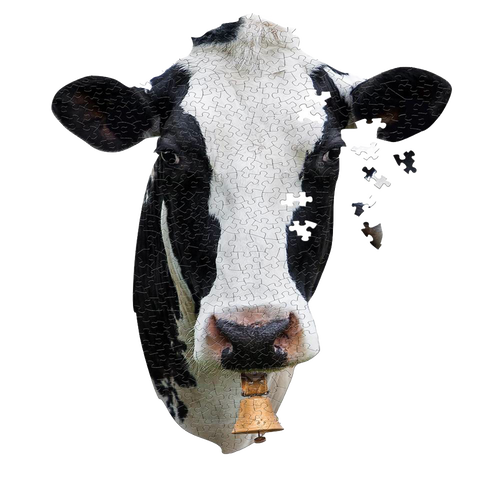 Partially assembled cow head-shaped jigsaw puzzle featuring a close-up black and white cow face with a bell, designed for children’s toys and games collections.