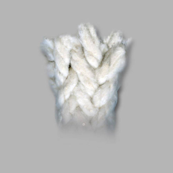 Close-up of thick, solid round braided cotton wicking with a soft, fibrous texture, ideal for lamps, lighting, and wick replacement in parts and accessories collections.