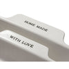 Close-up of a set of two handcrafted neutral-colored stoneware baking dishes with embossed “HOME MADE” and “WITH LOVE” text, ideal for Kitchen & Food and Baking Supplies collections.
