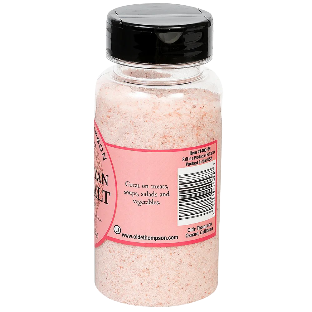 Clear plastic bottle filled with finely ground pink salt, featuring a black flip-top lid and a pink label with product information, part of Kitchen & Food and Pantry collections.