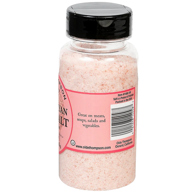 Clear plastic bottle filled with finely ground pink salt, featuring a black flip-top lid and a pink label with product information, part of Kitchen & Food and Pantry collections.