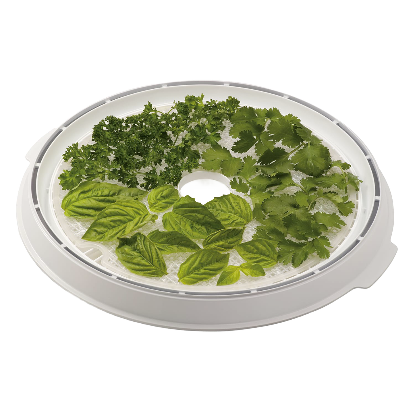 Round flexible drying screen placed on dehydrator tray with fresh herbs arranged on top, designed to prevent small food items from falling through, ideal for kitchen and food preservation use.