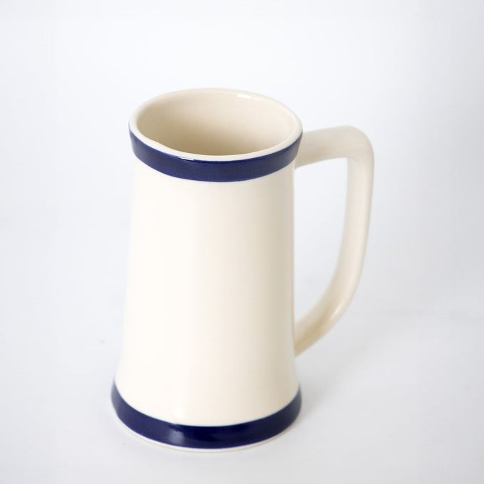 Handmade American stoneware stein mug with two blue stripes and comfortable long handle, ideal for Kitchen & Food, Dinnerware, USA Made, Best Sellers, and Promo Eligible collections.