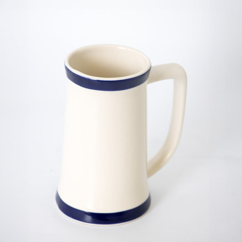 Handmade American stoneware stein mug with two blue stripes and comfortable long handle, ideal for Kitchen & Food, Dinnerware, USA Made, Best Sellers, and Promo Eligible collections.
