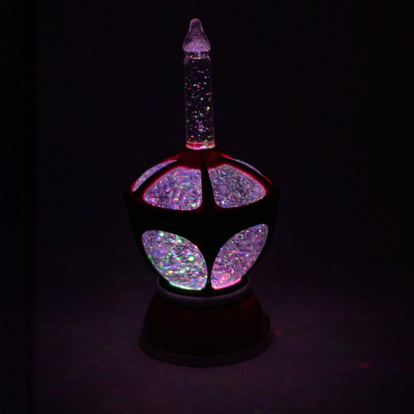 Unique handcrafted vintage-inspired holiday bubble light featuring swirling glitter inside a red and green glass body, ideal for Home & Decor, Holiday Decor, Best Sellers, Promo Eligible collections.