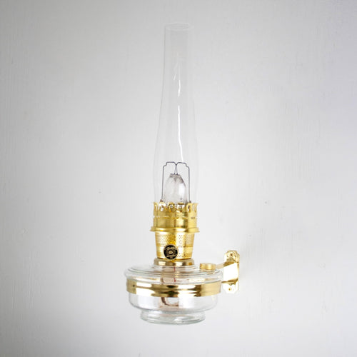 Handcrafted clear wall oil lamp with polished brass burner and chimney, designed for space-saving wall lighting in Farm, Garden & Tool, Lamps & Lighting, and Emergency Supplies collections.
