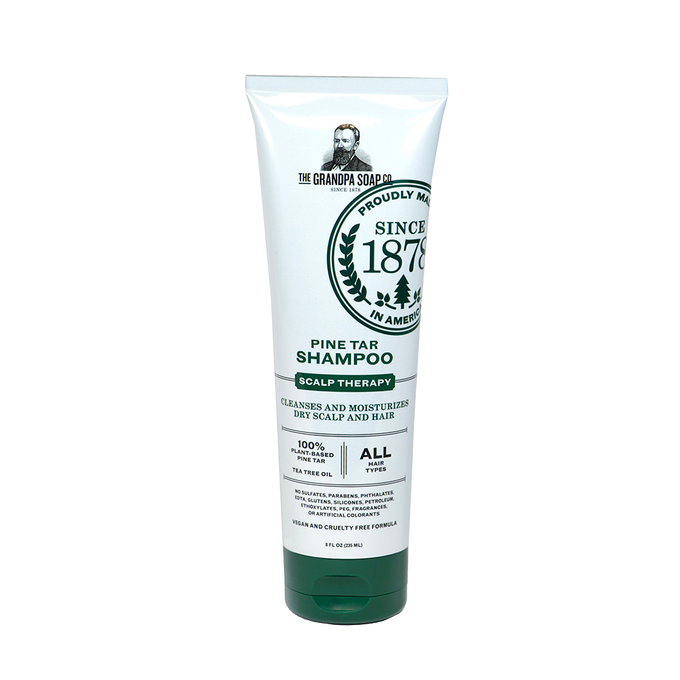 Tube of handcrafted pine tar shampoo featuring scalp therapy formula with tea tree oil, gentle for all hair types, made in USA, part of Health & Wellness and Grooming collections.