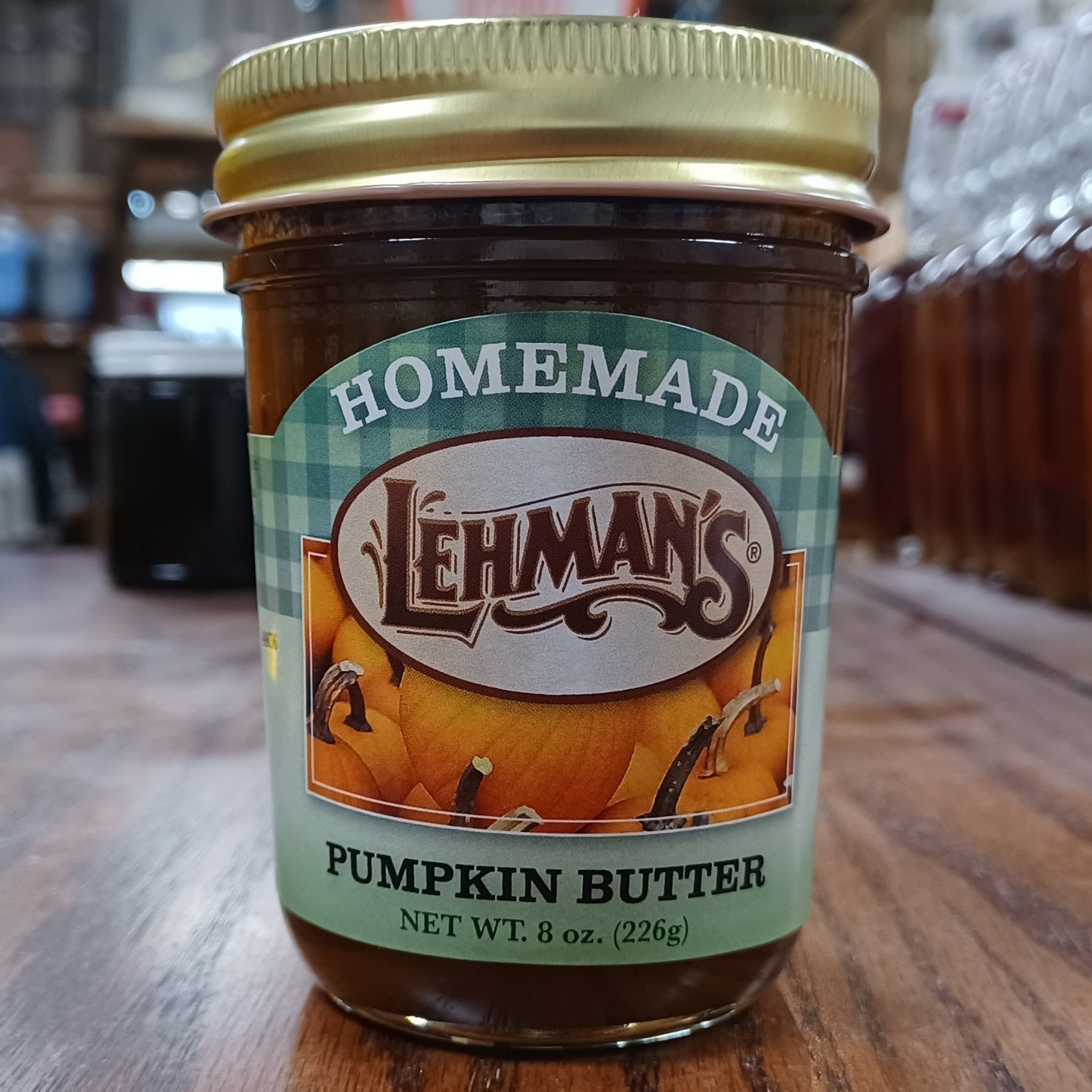 Glass jar of handcrafted Lehman's pumpkin butter made with all-natural ingredients, Amish made in USA, ideal for Kitchen & Food, Pantry, Peanut Butter & Jellies, USA Made, and Best Sellers collections.
