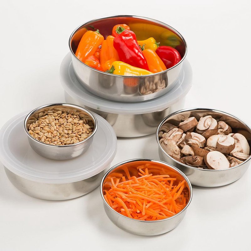 Set of stainless steel nesting bowls in various sizes with clear plastic lids, filled with fresh vegetables and nuts, ideal for Kitchen & Food, Storage and Serving, Best Sellers, Promo Eligible collections.