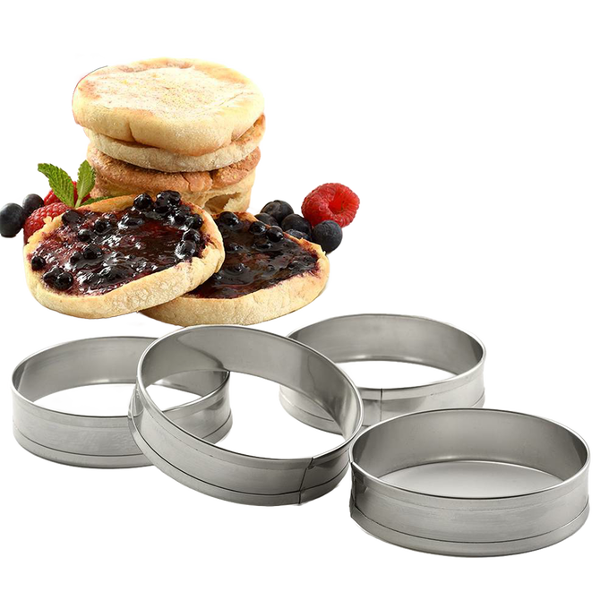 Set of four stainless steel muffin rings designed to shape and hold batter for English muffins and crumpets, shown with toasted muffins and berry jam, ideal for Kitchen & Food and Best Sellers.