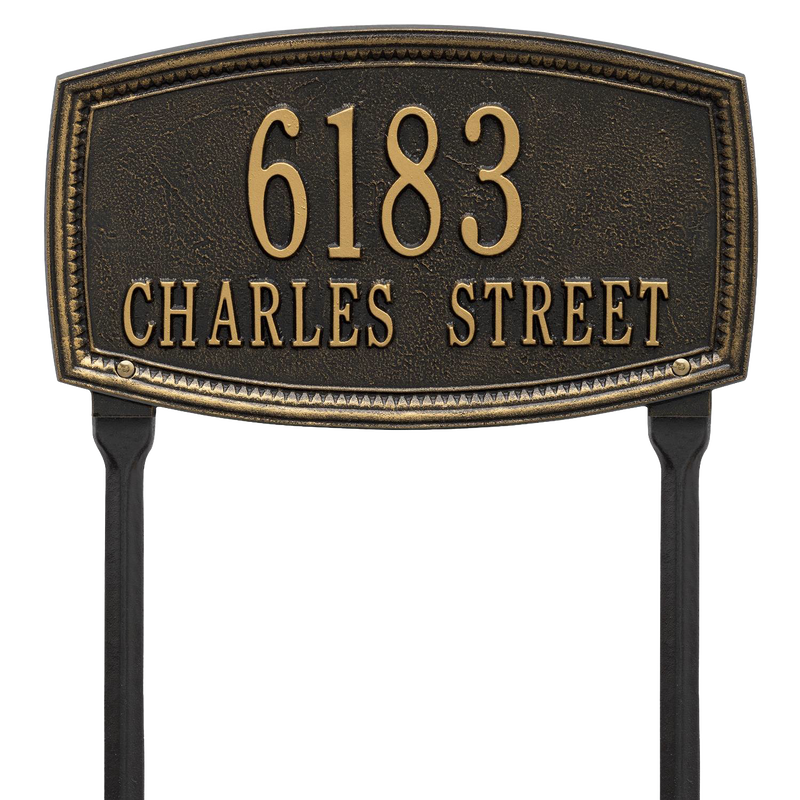 Black custom lawn address plaque with raised gold numbers and lettering featuring a traditional shaped border, designed to enhance curb appeal and made in USA.