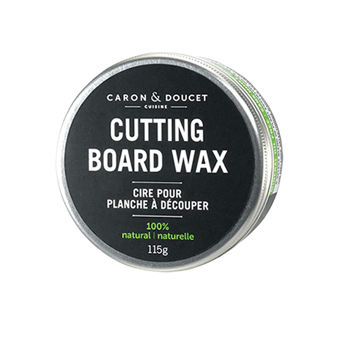 Round tin of 100% natural cutting board wax conditioner with green accents, designed for wood care in Kitchen & Food and Food Prep collections.