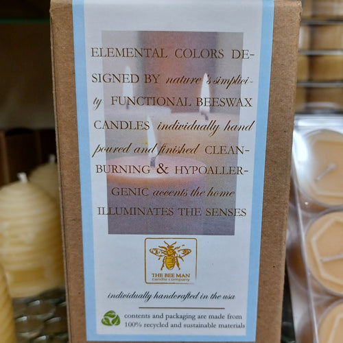 Packaging label featuring handcrafted beeswax candles with natural, clean-burning, hypoallergenic qualities, emphasizing simple elegance and sensory warmth, made in USA, part of Lamps & Lighting, Candles, USA Made, Best Sellers, Promo Eligible collections.