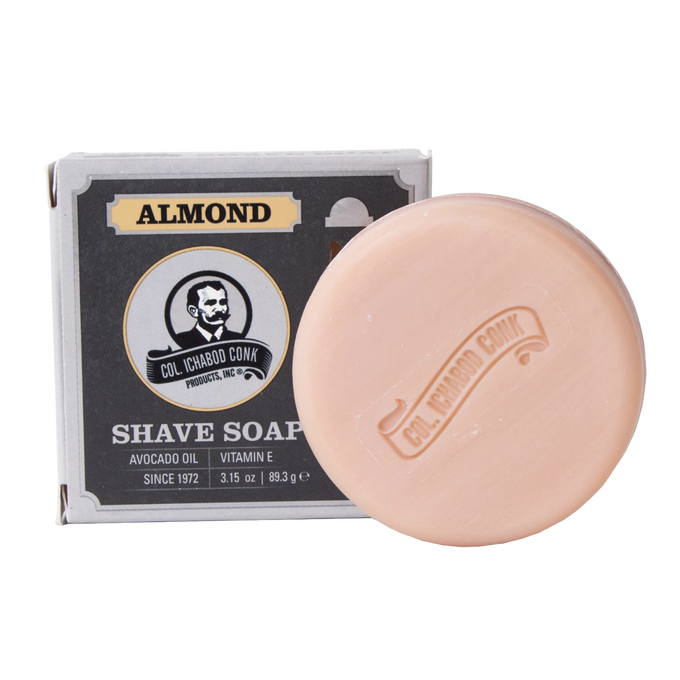 Handcrafted almond-scented shaving soap bar embossed with branding, enriched with avocado oil and vitamin E, made in USA, featured in Health & Wellness, Grooming, Soaps, and Best Sellers collections.