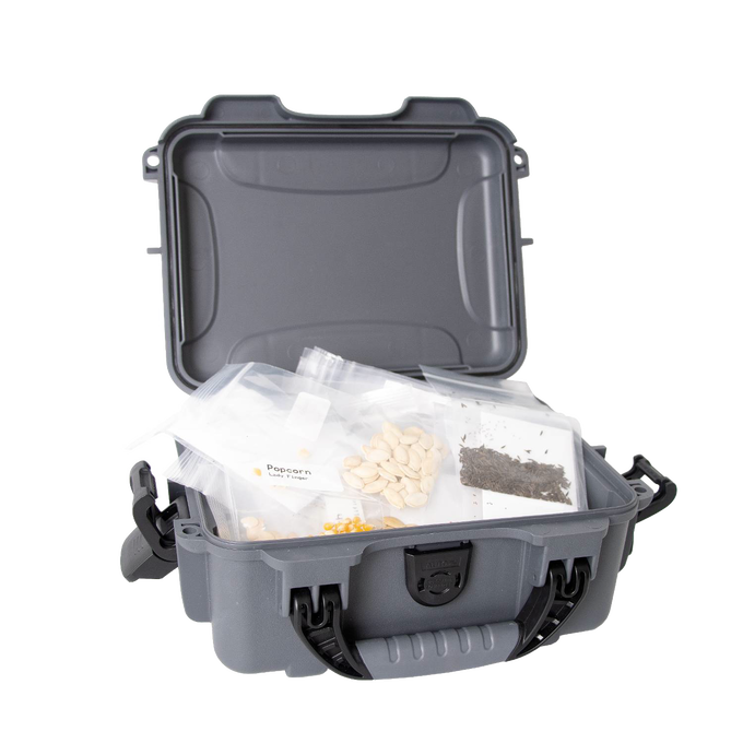 Durable waterproof storage case opened to show organized clear bags containing various heirloom seeds, designed for farm and garden use, handcrafted for durability and reliability.