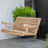Handcrafted Amish-made cypress porch swing with smooth slats and curved armrests, suspended by metal chains on a covered patio, featured in Home & Decor and Outdoor Furniture collections.