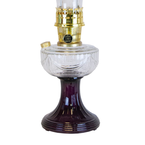 Handcrafted oil lamp with a deep purple glass Lincoln Drape base, clear glass font featuring embossed patterns, and a polished brass burner, perfect for Farm, Garden & Tool, Lamps & Lighting, Oil Lamps, Table Lamps, Best Sellers, Homesteading, and Promo Eligible collections.