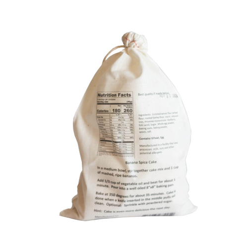 Natural fabric drawstring bag containing handcrafted banana spice cake mix with baking instructions and nutrition facts, ideal for Kitchen & Food, Pantry, Dry Goods and Mixes, Best Sellers, Promo Eligible collections.