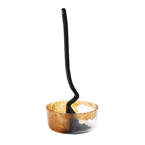 BBQ Brizzle basting brush with a deep, flexible scooping head resting inside a transparent glass bowl coated with barbecue sauce, ideal for Kitchen & Food and Grilling collections.