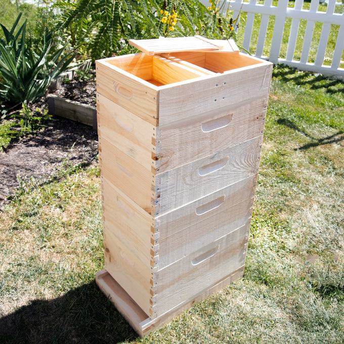 Handcrafted Amish wooden feeder designed to fit on top of 8-frame hives with two compartments and floating inserts, made in the USA for beekeeping and farm use.