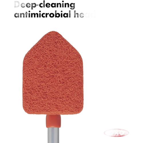 Orange abrasive cleaning head with antimicrobial properties in a unique pivoting shape, designed for deep cleaning in household cleaning, Home & Decor, and Cleaning Utensils collections.