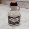 Handcrafted beige jug of amber maple syrup with a vintage-style brown label, made in USA, suitable for Kitchen & Food, Pantry, USA Made, Best Sellers, and Promo Eligible collections.