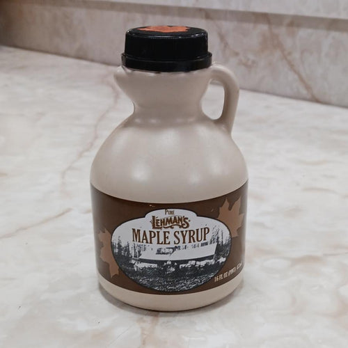 Handcrafted beige jug of amber maple syrup with a vintage-style brown label, made in USA, suitable for Kitchen & Food, Pantry, USA Made, Best Sellers, and Promo Eligible collections.