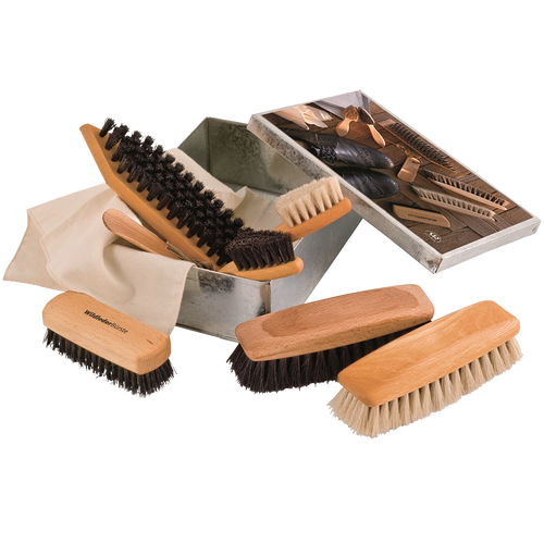 Wooden shoe care set featuring multiple brushes with natural bristles arranged beside a metal storage box and instruction booklet for cleaning and polishing footwear, ideal for cleaning utensils and best sellers collections.