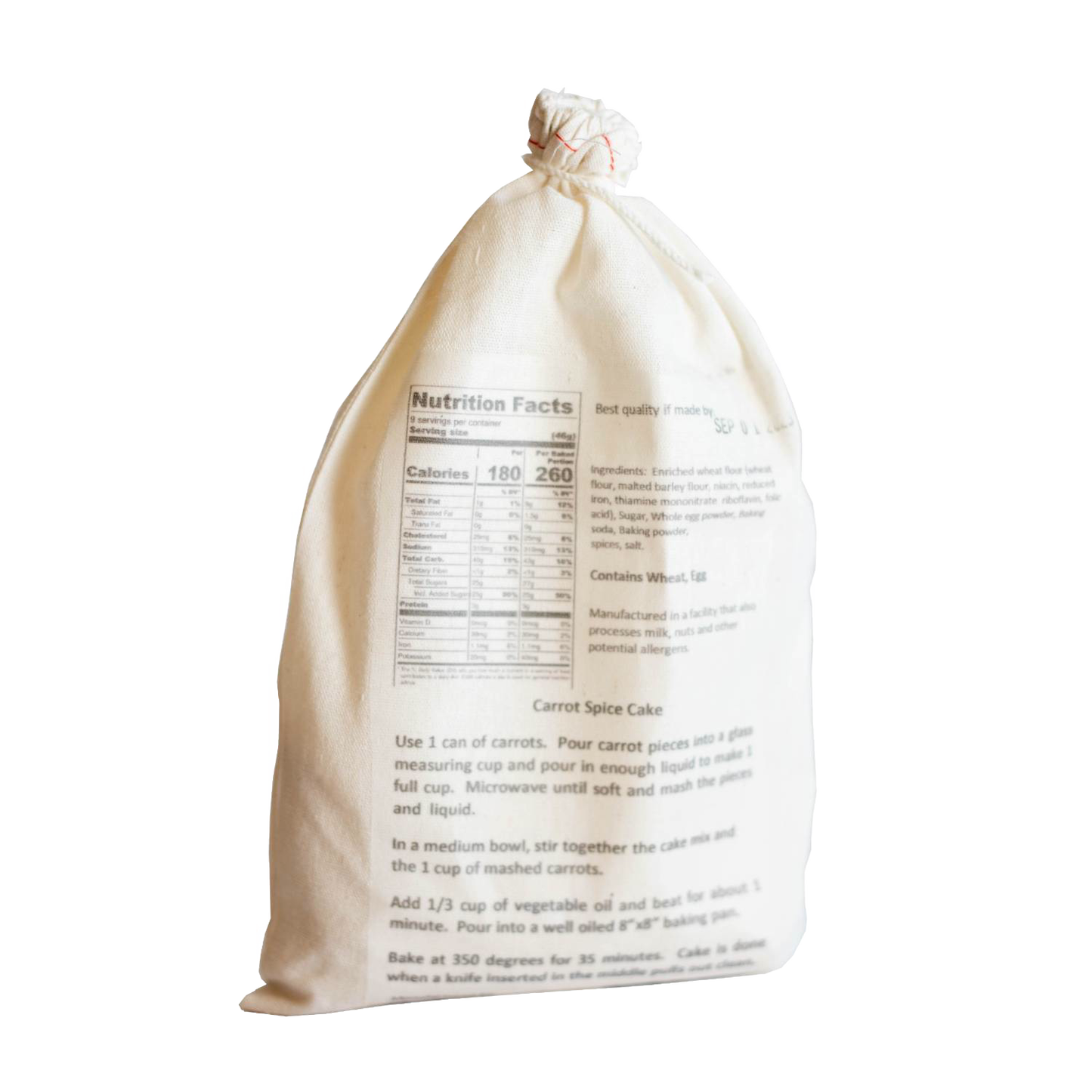 Natural fabric drawstring bag containing handcrafted carrot spice cake mix with detailed nutrition facts and baking instructions, ideal for Kitchen & Food, Pantry, Dry Goods and Mixes, Best Sellers, Promo Eligible collections.