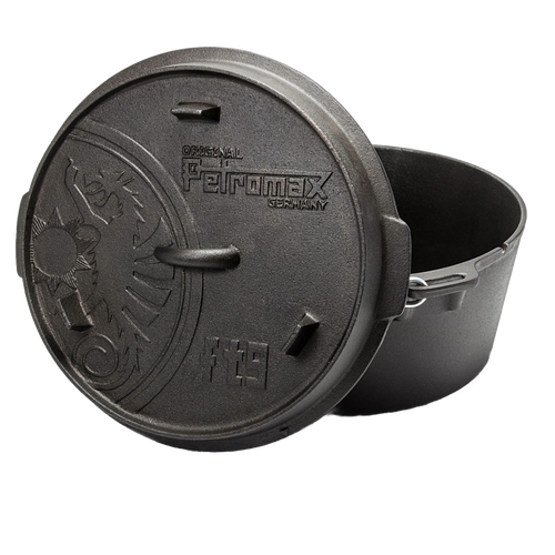 Heavy-duty cast iron Dutch oven with flat base and embossed lid featuring a dragon design, equipped with sturdy metal bail handle, ideal for Kitchen & Food, Cookware, Cast Iron, Best Sellers, Promo Eligible collections.