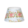 Parchment lamp shade with a soft blue lattice pattern and pink rose bouquet design, handcrafted to gently diffuse light; ideal for Lamps & Lighting, Lamp Shades, and Best Sellers collections.