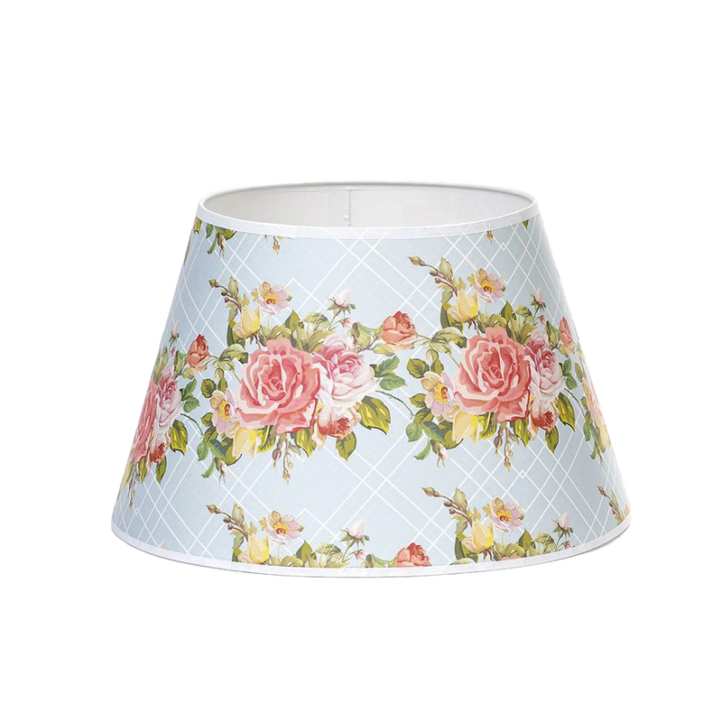 Parchment lamp shade with a soft blue lattice pattern and pink rose bouquet design, handcrafted to gently diffuse light; ideal for Lamps & Lighting, Lamp Shades, and Best Sellers collections.