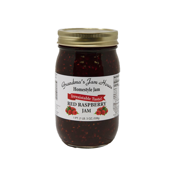 Handcrafted jar of red raspberry jam with gold lid and label showing raspberries and "Irresistable Taste," made in USA, featured in Kitchen & Food, Pantry, Peanut Butter & Jellies, USA Made, Best Sellers, and Promo Eligible collections.