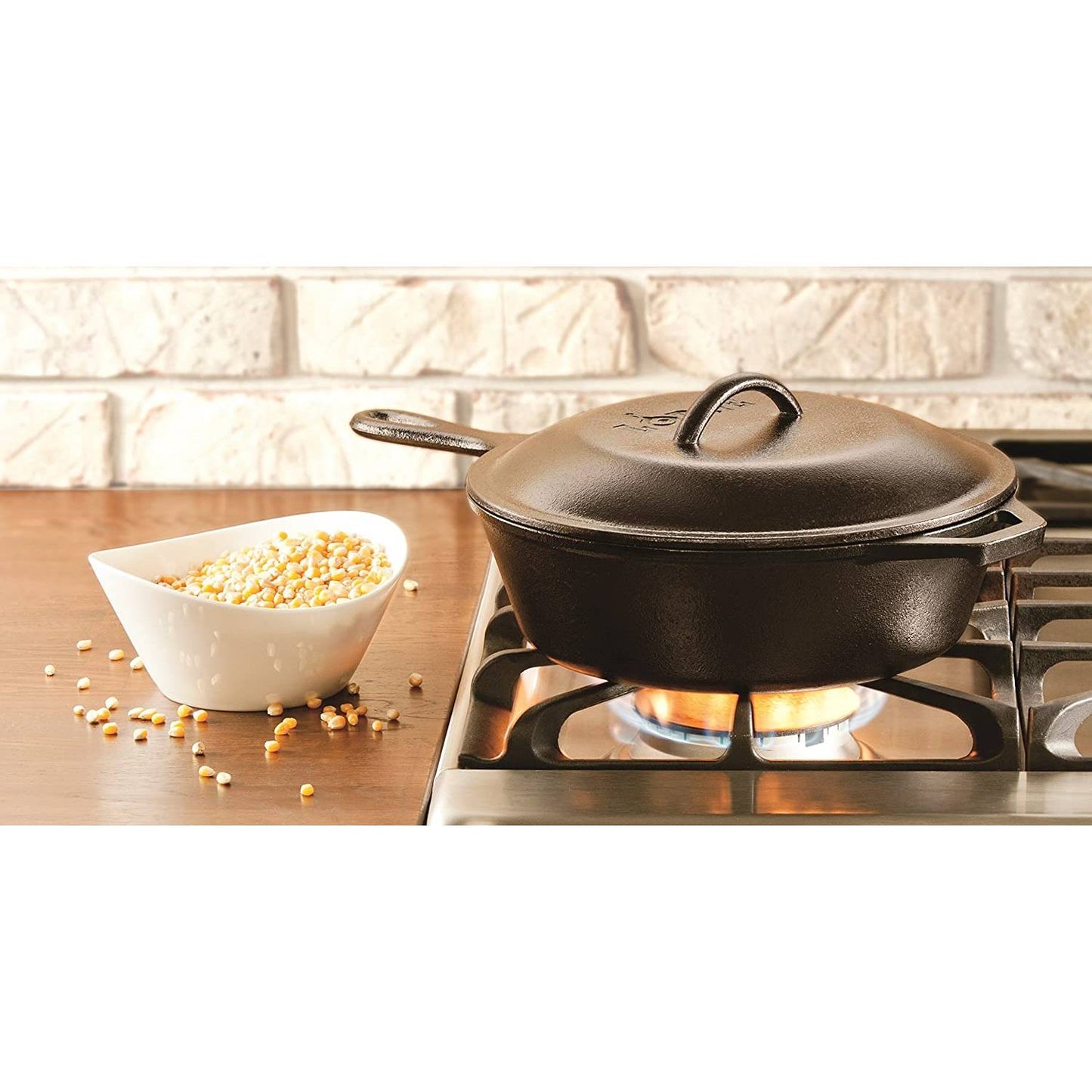 Handcrafted cast iron skillet lid with self-basting tips, seasoned with natural vegetable oil, shown on stovetop with a bowl of popcorn kernels, ideal for Kitchen & Food, Cookware, Cast Iron, Best Sellers, and Promo Eligible collections.